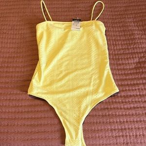 Yellow Body suit